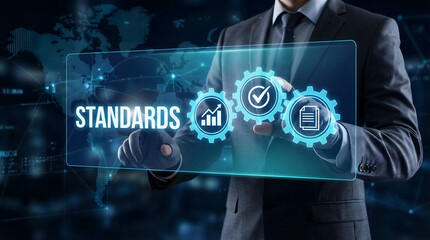 Businessman interacts with glowing virtual screen displaying standards and process gears