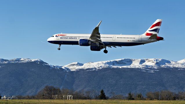 Geneva, Switzerland - February 22, 2026: signs and logotype on an Airbus A321-231 of British Airways take off from Geneva airport with snow-covered Jura mountains