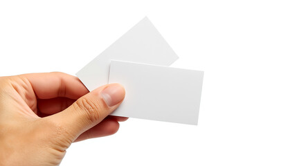 Fototapeta premium Close-up studio shot of a human hand holding two blank white business cards, overlapping slightly, on a pure white background with soft diffused lighting and subtle shadows.