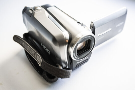 A retro Panasonic camcoder with LCD flip screen.