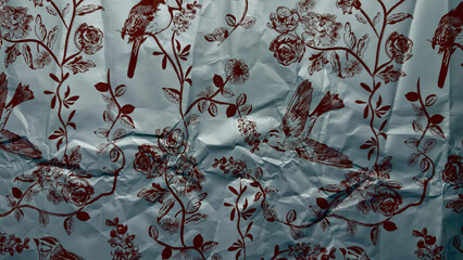 vintage wrinkled teal foil with burgundy bird and rose vine illustrations for web design background...
