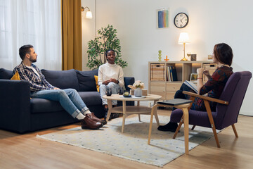 Couple receiving psychotherapy counseling from psychologist