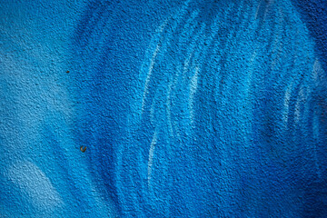 Blue spray painted wall texture
