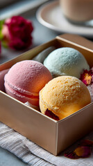 Colorful bath bombs in a gift box with rose petals