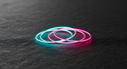 Glowing neon rings on dark textured background
