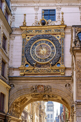 Fototapeta premium A historic gold-colored astronomical clock The clock is located in the city of Rouen, France Photo taken close-up