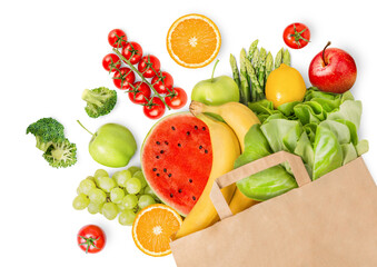 paper bag with vegetables and fruits lying on an isolated white background © Ирина Гутыряк