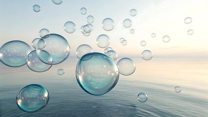 Numerous clear and colorful soap bubbles suspended above tranquil ocean water at dawn