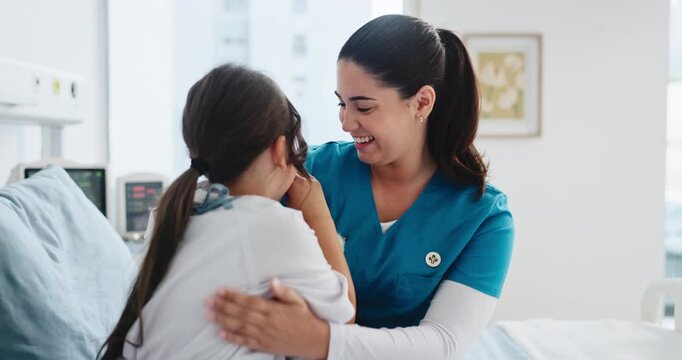 Woman, nurse and smile with child in hospital for reassurance, medical interaction and healing. Healthcare worker, happy or compassion with kid for emotional comfort, pediatric and treatment recovery