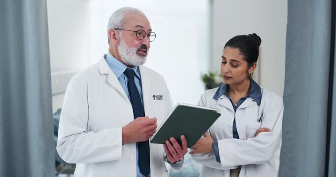 Doctors, team and discussion with tablet in clinic for surgery update, treatment plan and feedback. People, healthcare staff and tech with conversation on health results, workflow schedule or opinion