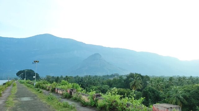 Chulliyar Dam reservoir, a scenic pan of Palakkad, Kerala. Featuring Nelliyampathi Hills and tropical greenery, this famous Malayalam film location is a serene outdoor landscape in the Western Ghats