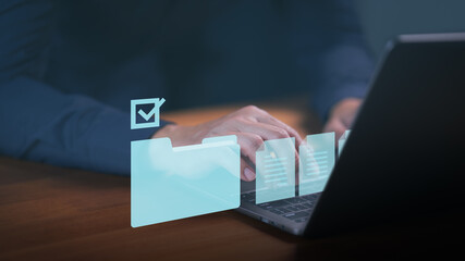 Professional document management and digital data storage on laptop. Concept of folder organization, file security, business workflow, and office technology solutions.