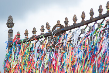 Ribbons of Senhor do Bonfim on an Iron Fence
