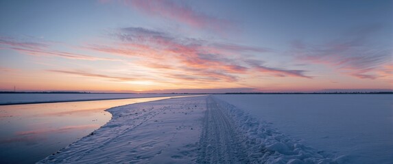 Sunset with cotton candy sky above the half-frozen Baltic Sea