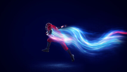 Digital mixed media. American football player sprinting with glowing light trail. Concept of aggression emotion, high performance, modern sports visuals, dynamic advertising use. © master1305