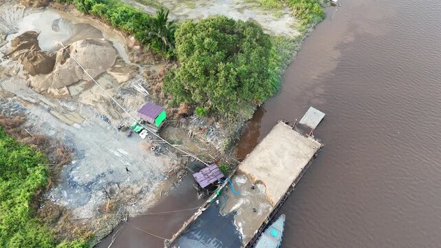 Aerial view of sand processing on the river bank