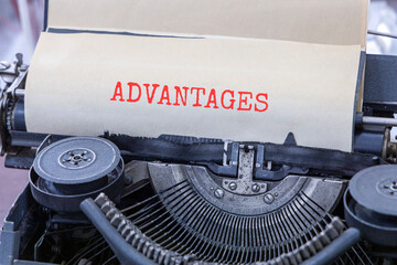 Advantages symbol. Concept word Advantages typed on beautiful old retro typewriter. Beautiful white paper background. Business advantages concept. Copy space.