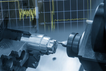 Abstract CNC Lathe Drilling Process on Metal Shaft with Graph Indicator Background