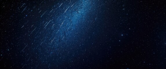 Meteor shower over a dark background featuring a stream of meteorites and falling stars