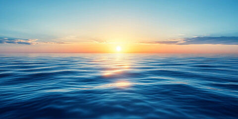 Fototapeta premium Sunset over calm ocean waters with golden reflection on the horizon 