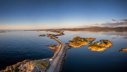 panoramic view of the Atlantic Ocean Road near Kristiansund in central Norway at sunset © makasana photo