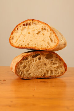Neapolitan cafone bread with white flour, freshly baked in a bakery and ready to be sold