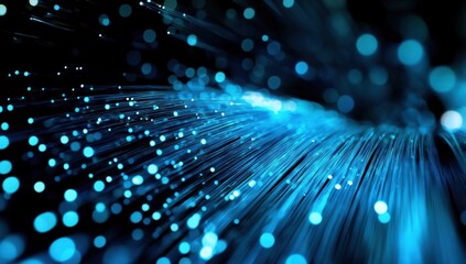 An abstract image featuring dynamic blue lines and glowing dots, creating a sense of movement and depth.