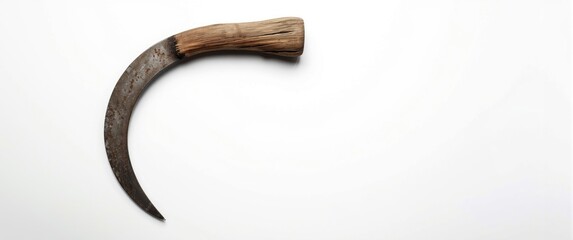 Old metal sickle with wooden grip isolated on white surface