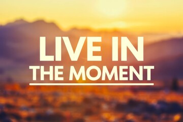 Inspirational motivation quote with blurred background. LIVE IN THE MOMENT.