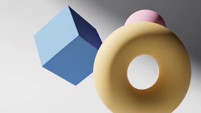 Abstract geometric shapes floating with soft lighting and pastel colors