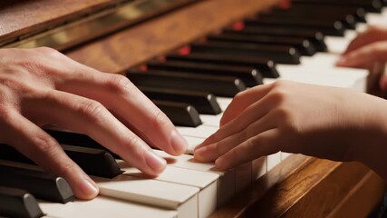 Music teacher guiding student hands on piano slow motion education art talent background copy space hobby lifestyle classical instrument
