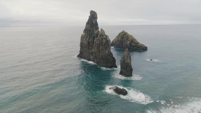 4K video; Slow drone flight over the Atlantic ocean with the seastacks of Ribeira da Janela north of the island of Madeira