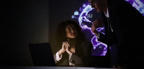 Ai and Business. Tech Startup team discussing and using artificial intelligence or digital Ai assistant.  Business innovation AI technology collaboration and ideas for future. Tech brainstorming idea