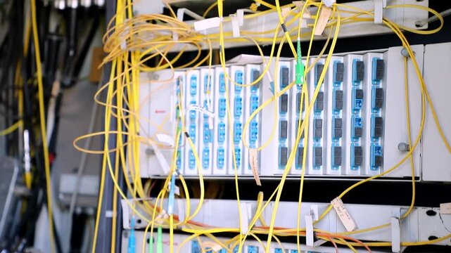 Fiber Optic Network Cabinet With Connected Cables and Telecommunication Equipment