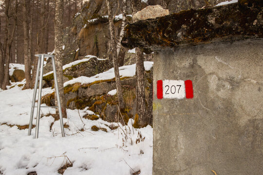 Trekking paths signs in Alagna Valsesia, at the slopes of Rosa Massif, during wintertime. It has located in Piedmont Region (Northern Italy) and it's a rinomate ski resort.