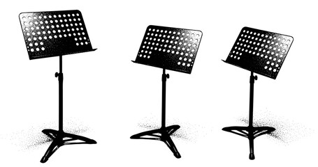 Fototapeta premium Three adjustable black music stands with perforated sheet holders in a row