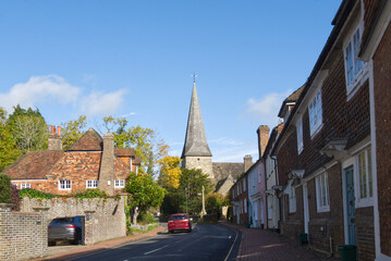 Main street leading past church at Cuckfield, West Sussex, England