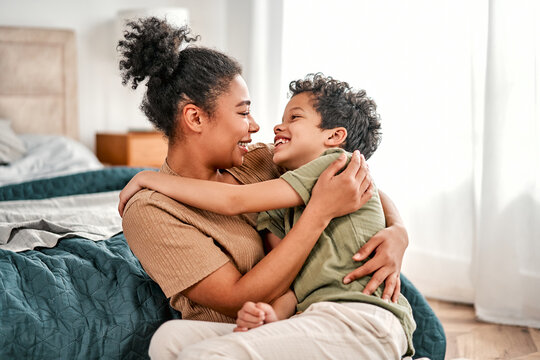 Mother and son hugging at home, celebrating Mother&rsquo;s Day, sharing love and joyful family moments.Happy Mother's Day!