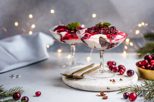 Layered trifle dessert with chocolate Brownie with Ricotta Cream and Cranberry Sauce