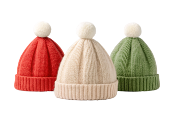 Three colorful knit beanie hats with pompoms, red cream green winter wear, isolated on a transparent background