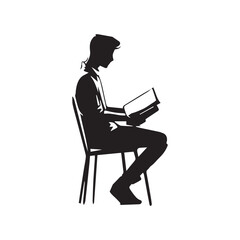 silhouette of a man reading a book