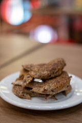Fried chicken served on plate