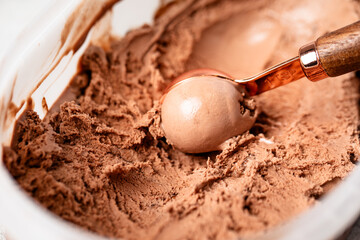Scooped chocolate ice cream or chocolate ice cream background