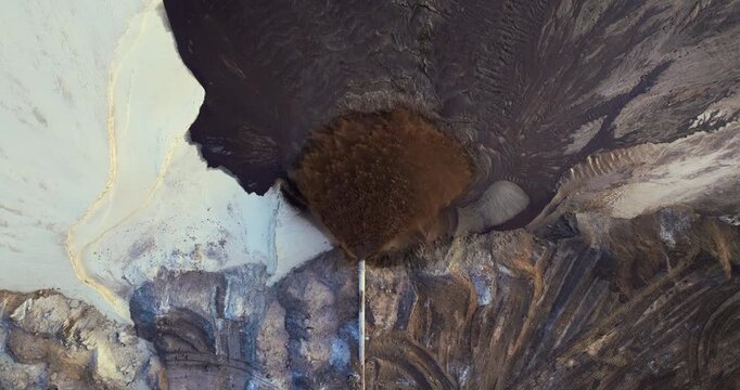 Active phosphate mine in Florida with slurry pipeline transporting water, clay and sand from dredging pit.