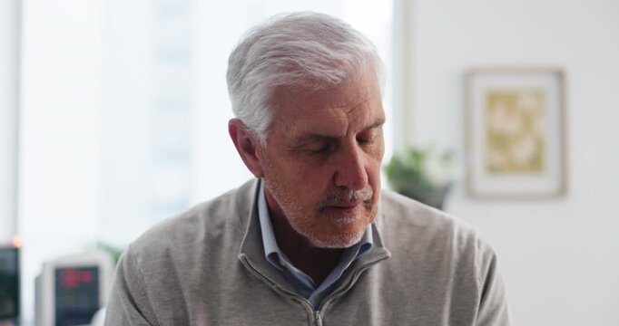 Stress, patient and senior man in hospital room, think and waiting for appointment, anxious and sick. Healthcare, delay and impatient for checkup, reflection and old person with depression in clinic