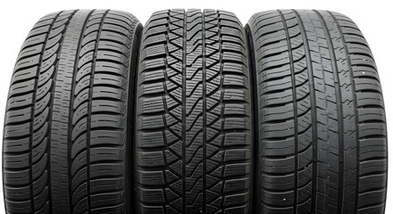 Fototapeta premium Three black winter tire treads with deep grooves and sipes aligned side by side on white background