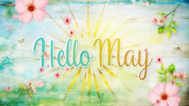 Hello may lettering on painted wooden background with sunburst and pink blossoms, teal and yellow tones, topview flatlay with copyspace around the text, cheerful seasonal greeting atmosphere