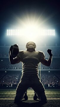 Dramatic Football Player Celebrating Victory in Stadium under Bright Lights