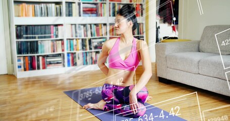 Doing middle-aged woman twisting on purple mat at home wearing pink sportswear with digital overlay