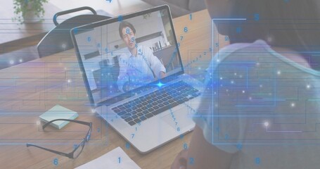 Watching worker leaning toward laptop at home desk, onscreen man wearing light top, data overlay